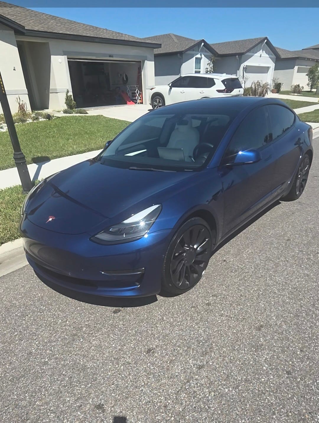 Blue Tesla Model 3 after a GG Detailing mobile detail