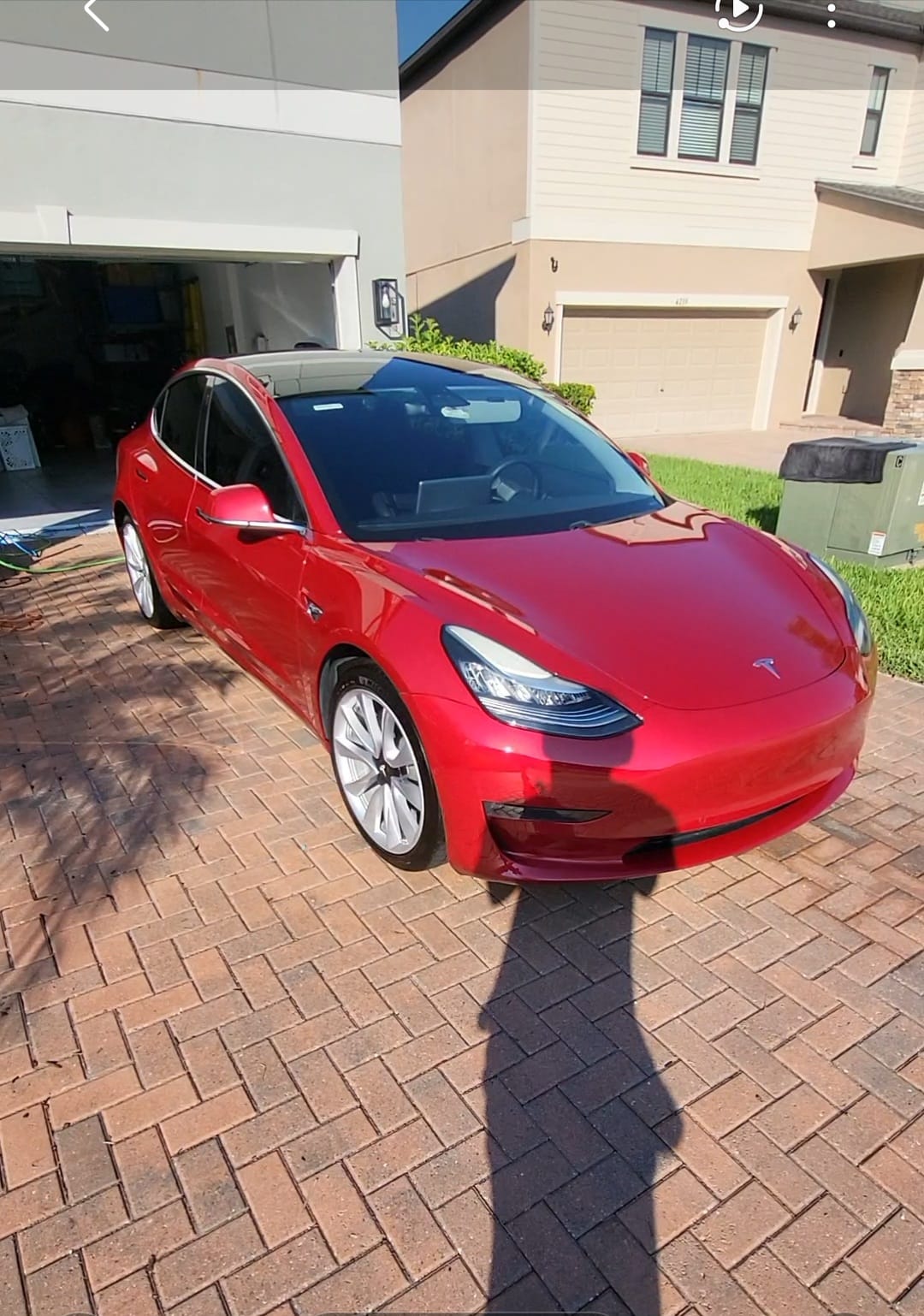 Red Tesla Model 3 after a detail, GG Detailing